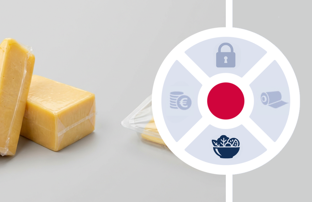 Cheese block in a clear barrier vacuum pack and portioned cheese in a tray